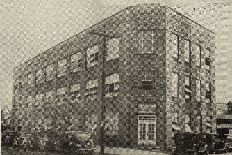 Vintage black and white photograph of the Rocky shoes factory in Southeastern Ohio, 1932